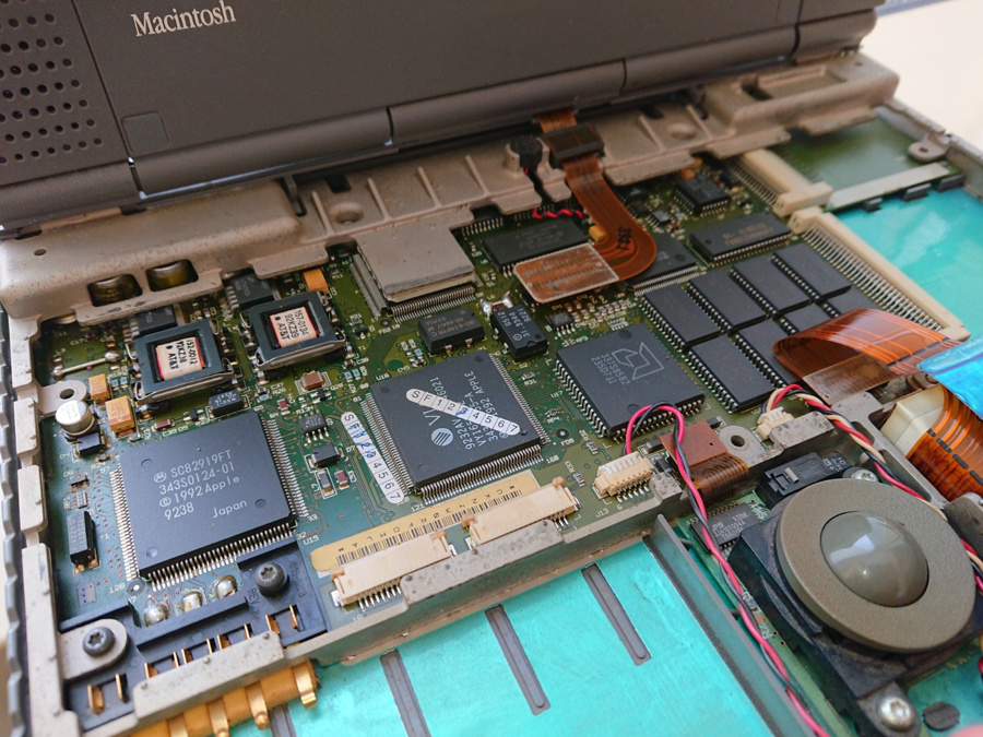 Motherboard of a disassembled Macintosh PowerBook Duo 230 laptop